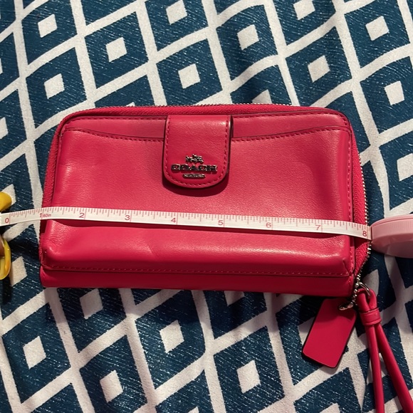 Used a few times Coach zip around phone wallet wristlet - Picture 7 of 7